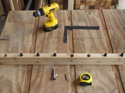 Bottom rail drilled with evenly spaced holes for baluster connectors